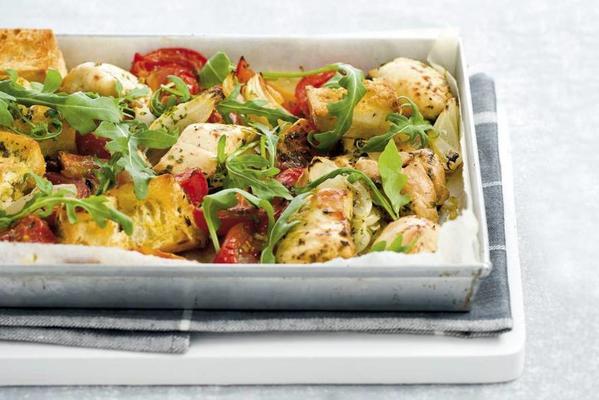 oven chicken with tomatoes and arugula