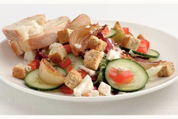 fresh salad with white cheese and croutons