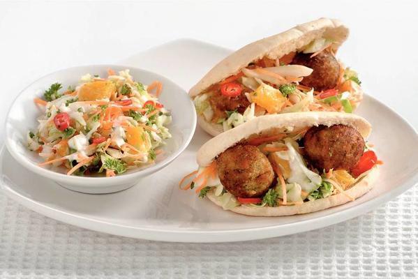 shoarma sandwiches with falafel and spicy cabbage lettuce