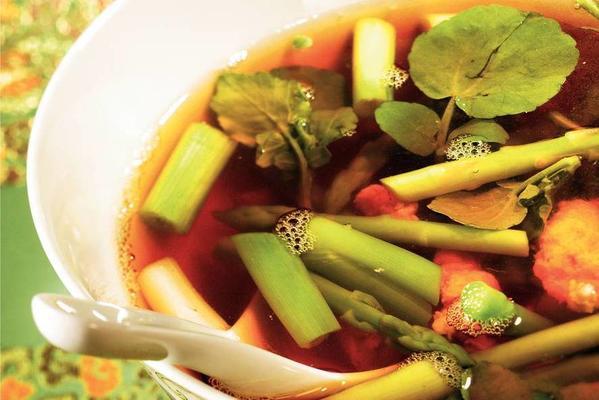 chicken soup with asparagus tips and watercress