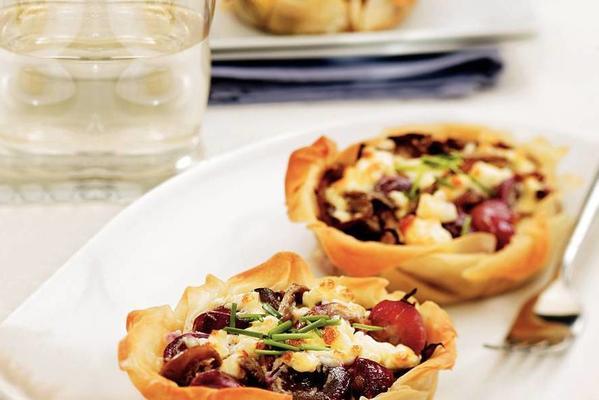 filo pastry tarts with mushrooms, grapes and cheese