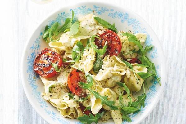 pasta with pesto sauce and grilled tomatoes