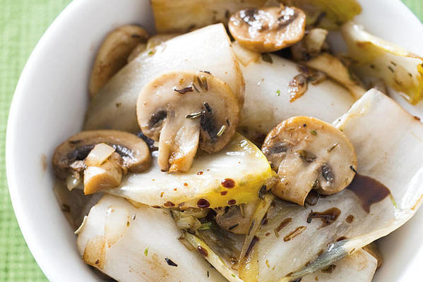 fried chicory with mushrooms and balsamic vinegar