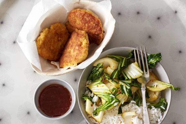 fish cakes with rice, bok choy and chili sauce