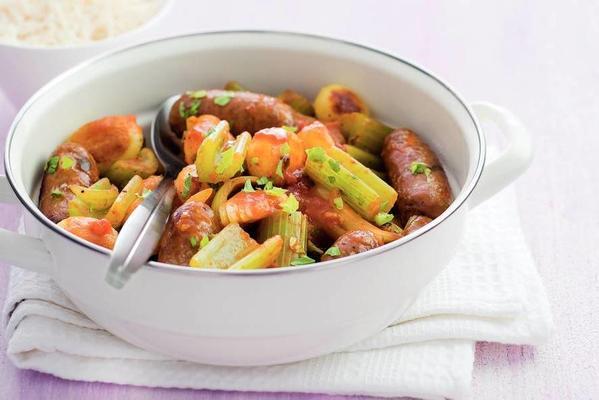 pan with celery and sausages