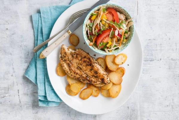 chicken with baked potato slices and salad