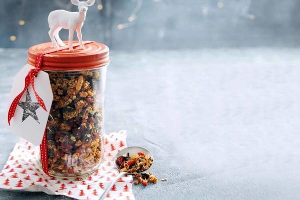 Christmas granola with cranberries, coffee, nuts and chocolate