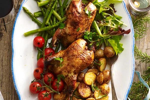 partridge with roasted potato and tomato and blanched asparagus tips