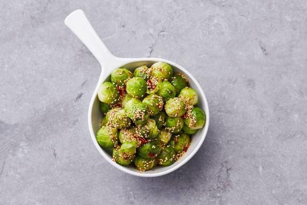 steamed sprouts with sweet soy sauce and sesame seeds