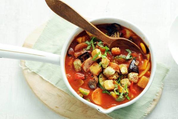 well-stocked tomato-vegetable soup with smoked sausage