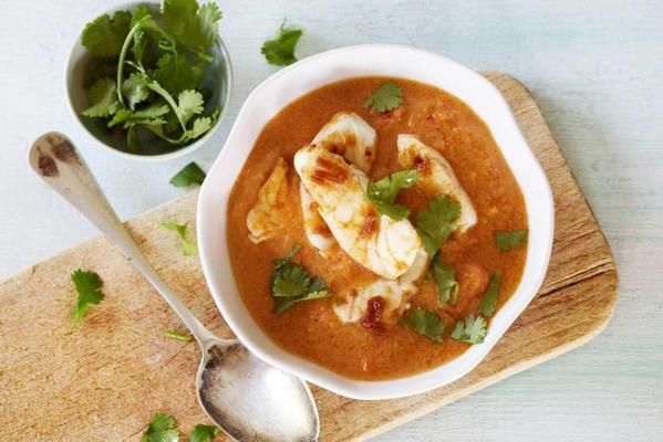 red lentil soup with seasoned fish strips