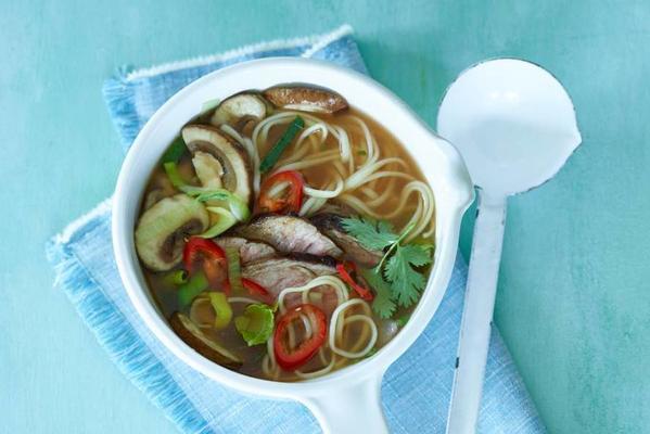 noodle soup with steak and bok choy