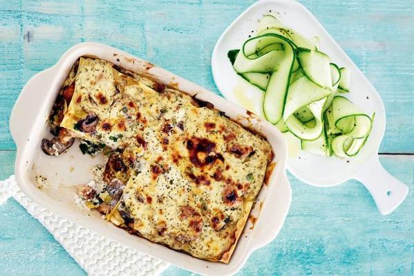 richly filled lasagna with chicken and kale
