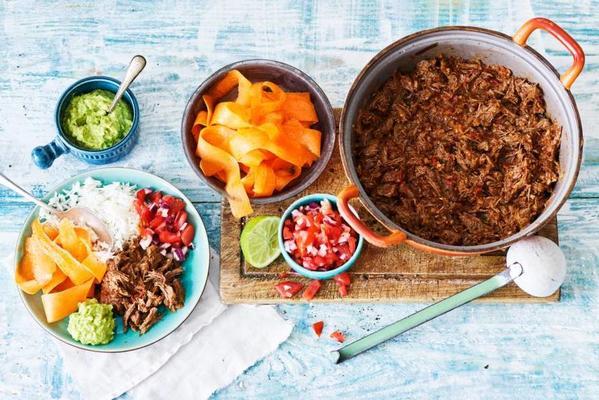 pulled beef carnitas with salsa and avocado puree
