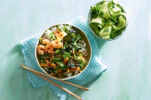 rice bowl with prawns and asian wok vegetables in sesame soy sauce