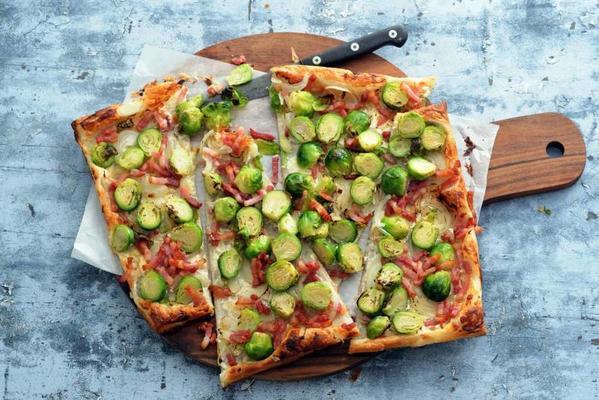 plate pizza with bacon, onion and sprouts