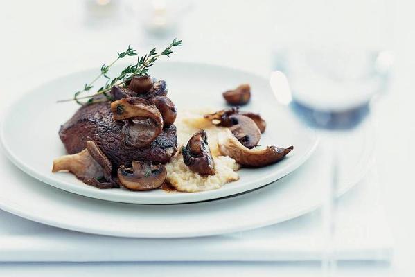 deer steaks with creamy sauerkraut puree and fried mushroom melange