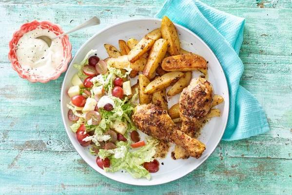 spicy drumsticks with fries and apple salad