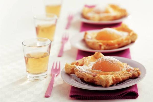 puff pastry cakes with yellow cream and peach