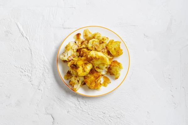 roasted cauliflower florets with curry and almond