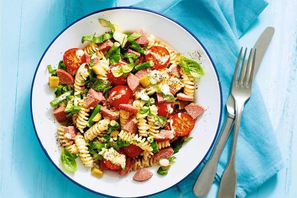 pasta salad with beef cervelat, tomato and green beans