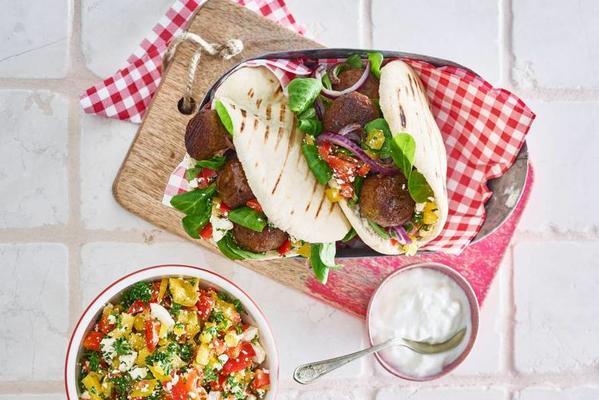 pita bread with falafel and pepper salad with white cheese