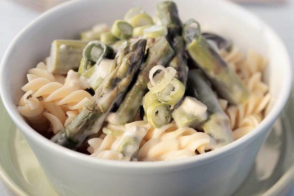 pasta with green asparagus in cheese sauce