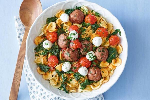 pasta with chicken balls and tomato from the oven