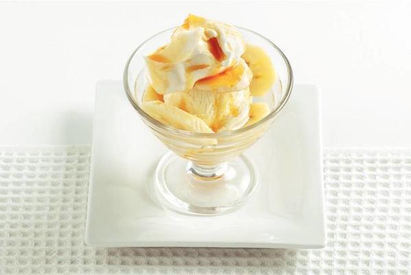 ice cream sundae with banana and whipped cream