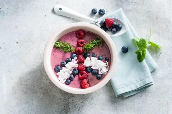 smoothie bowl with forest fruits and cocoa