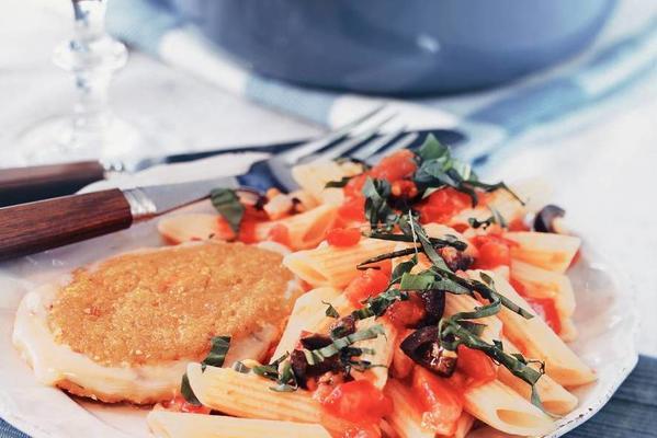 cheese schnitzel with pasta and tomatoes