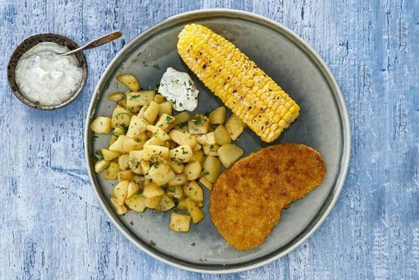 vegaschnitzel with grilled corn and baking potatoes