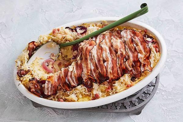 sauerkraut dish with ham and crunchy bacon from the oven
