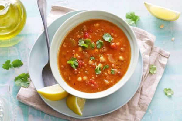 richly filled spicy lentil soup with tomato and chickpeas