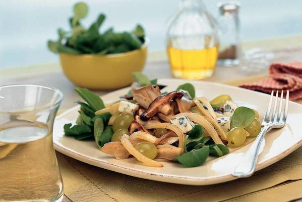 mushroom salad with grapes and bluefin cheese