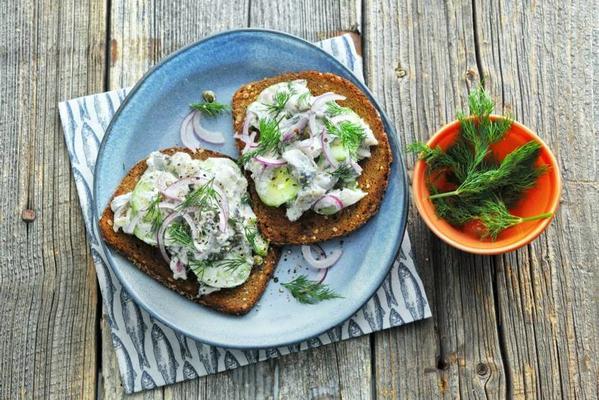 roasted rye bread with herring in sour cream