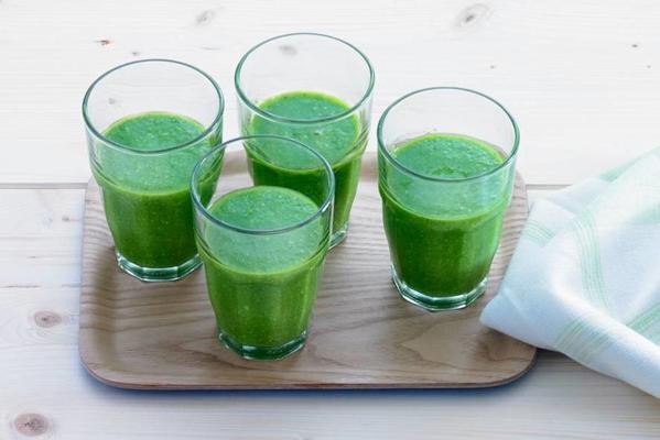 green smoothie with spinach and wheat grass