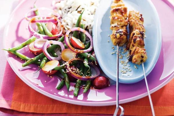 thai chicken skewers with rice and salad
