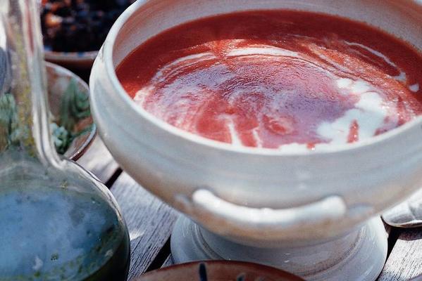 gazpacho (cold tomato soup) with herb oil and potato cream