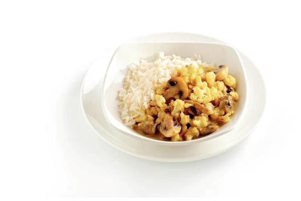 white rice with vegetable curry in coconut curry sauce