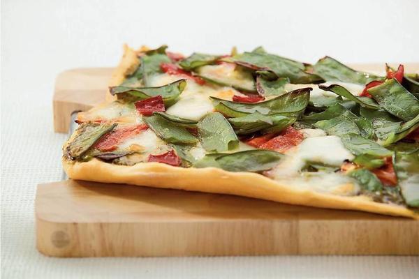pesto pizza with snow peas and peppers
