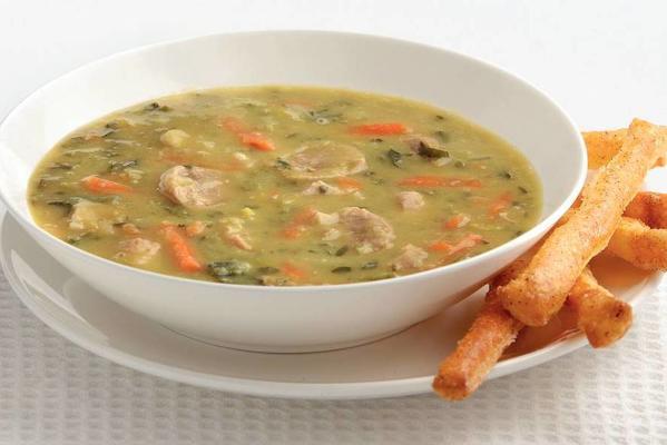 coarse pea soup with breadsticks