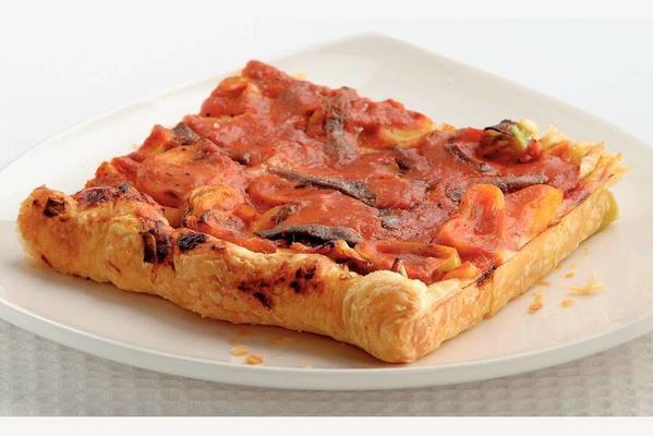 plate pizza with anchovies