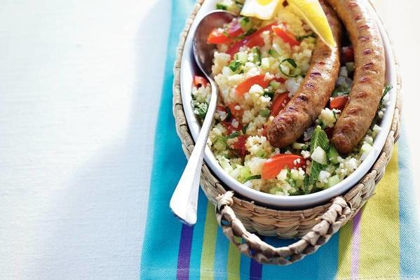 couscous salad and lamb sausages