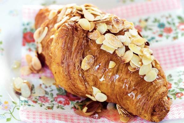 croissant with honey and roasted almonds