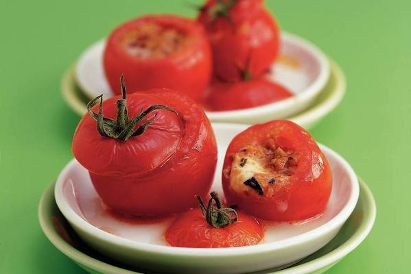 tomatoes from the oven filled with mozzarella
