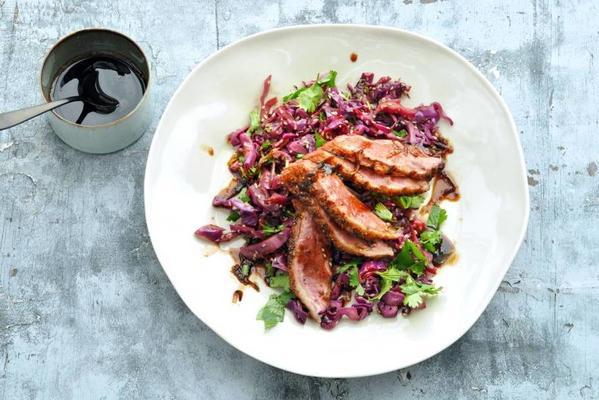 duck breast with orange glaze and red cabbage
