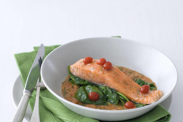 poached salmon on spinach