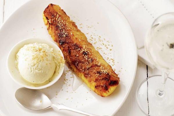 grilled pineapple with ice cream and roasted coconut