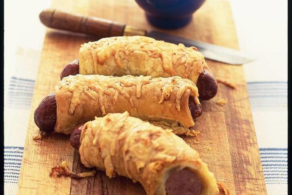sausages in puff pastry with fried cabbage